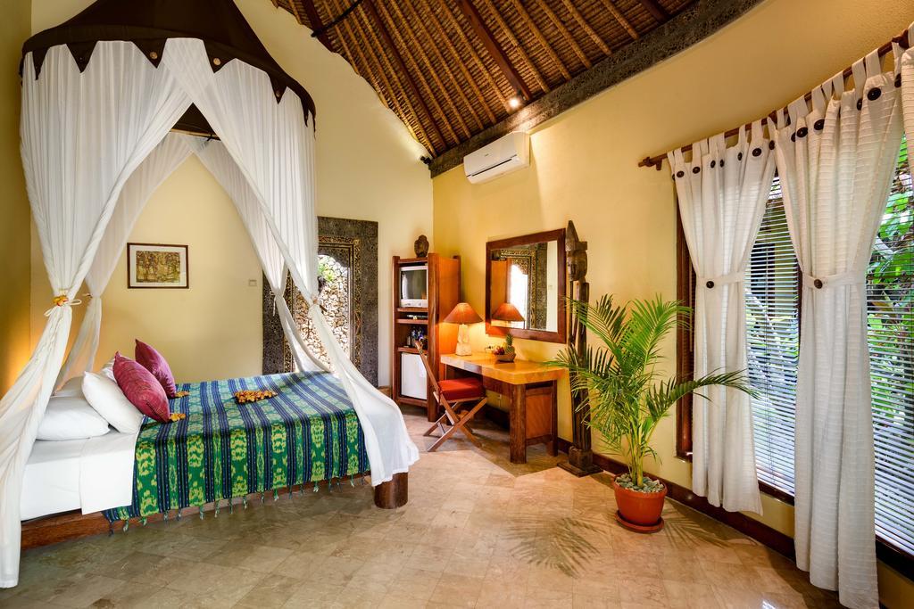 Hotel Puri Madawi Семиняк Стая снимка